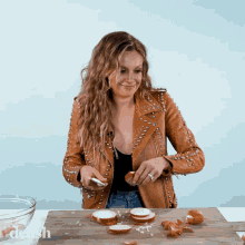 Throwing Onion Slice Carly Pearce GIF - Throwing Onion Slice Carly Pearce Delish GIFs