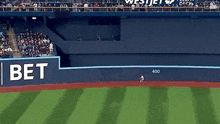 a baseball field with a bet sign in the outfield