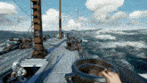 a video game shows a person holding a bucket in the ocean