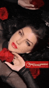 a woman is laying in a bathtub with red roses and a red sign that says iveelenamusic