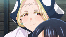 a blonde anime character with a crown on her head is smiling