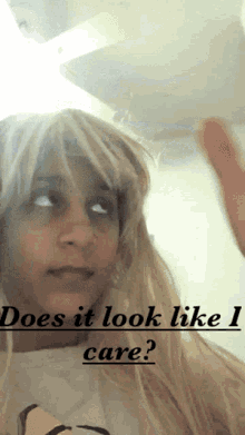 Does It Look Like I Care Blonde Wig GIF - Does It Look Like I Care Blonde Wig Dhriti GIFs