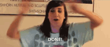 a woman in a blue shirt says " done "