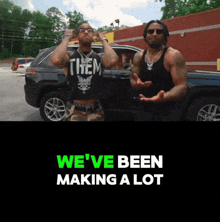 two men standing in front of a car with the words " we 've been making a lot "