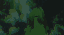 a person is holding a green object in a dark room .