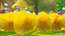 a group of smurfs standing next to each other