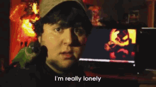 a man says i 'm really lonely in front of a computer