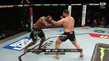 a ufc fight between abdel wahab and usman is shown on the screen