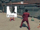 a man in a red suit is standing in front of a fence with a picture of morgan freeman and the words " false "