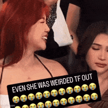 a woman holding a sign that says " even she was weirded tf out "