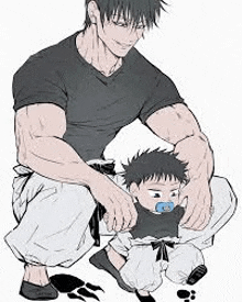 a man is kneeling down next to a baby with a pacifier in its mouth .