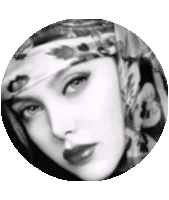 a black and white photo of a woman wearing a scarf around her head .