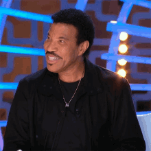 Laughing Lionel Richie GIF - Laughing Lionel Richie Idols Global GIFs