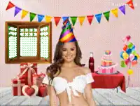 a woman in a party hat is standing in front of a birthday cake and gifts .