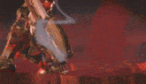 a video game scene with a bow and arrow being thrown