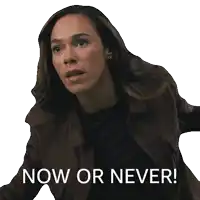 a woman 's face is shown with the words now or never below her