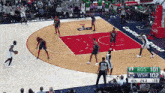 a basketball game is being played on a court that has bos 101 on it