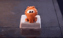 garfield is talking to a boy in a cartoon