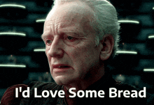 an older man says i 'd love some bread in front of him
