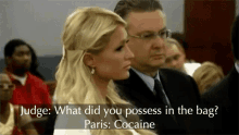 a woman in a courtroom with a caption that says " judge what did you possess in the bag paris cocaine "