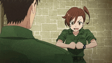 a man and a girl are standing next to each other and the girl is wearing a watch on her wrist