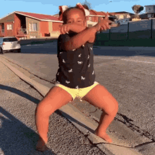 little girl dancing celebrating getting