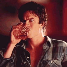 Damon Salvatore The Vampire Diaries GIF - Damon Salvatore The Vampire Diaries Blood Drinking Salvatore GIFs