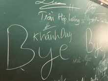 a blackboard has the word bye written on it