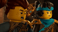 two lego figures are standing next to each other and one of them has a scarf around her head that says yoyo