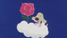 a dog with wings is sitting on a cloud holding a pink rose