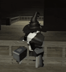 a black and white video game character wearing a witch hat is sitting on a wooden bench .