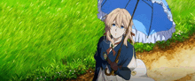 a girl in a blue dress is holding a blue umbrella in a field .
