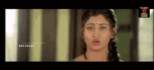 a screenshot of a telugu cinema zone showing a woman
