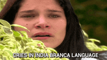 a woman is crying with the words cries in india branca language above her