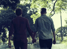 gay couple holding hands couple