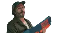 a man holds a psycho hydro water gun