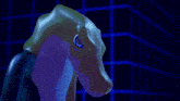 a statue of a crocodile with a blue eye