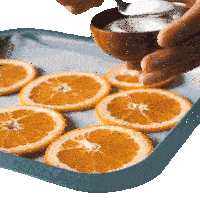 Adding Sugar On Top Of Sliced Orange Two Plaid Aprons Sticker - Adding Sugar On Top Of Sliced Orange Two Plaid Aprons Sprinkle Sugar Stickers