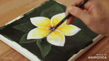 a person is painting a yellow flower on a canvas made in animatica