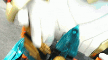 a person is holding a toy that looks like a robot ..