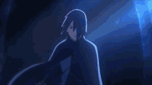 a man in a black cape is holding a blue light