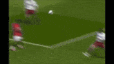 a soccer game is being played in front of an advertisement for season to 60