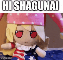 a stuffed doll is sitting on a bed with the words hi shagunai written on it .