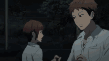 two anime characters are standing next to each other in the dark