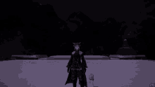 a woman and a child are standing in a dark room