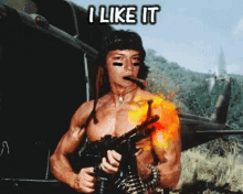 a shirtless man holding a gun and smoking a cigar with the words i like it above him