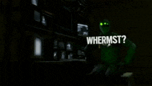 a man in a green suit is standing in front of a monitor with the words whermst written above him