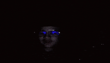 a man wearing sunglasses and a hat is making a funny face .