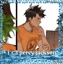 percy jackson is wearing a necklace and a ring while sitting in front of a laptop computer .