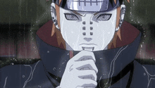 a close up of a person 's face with a bandana on it